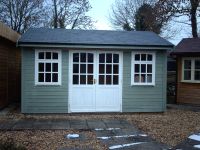 14x10 Orchard Room - painted willow cladding and white windows. 