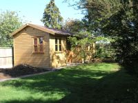 24 x 14 Studio with 2 doors in a double recess - Features garden office double glazed doors and windows and a felt tile roof