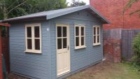 14 x 10 Summer Room with garden office D/G windows. Painted in Sky Grey Blue Protek, and Cream Windows. 